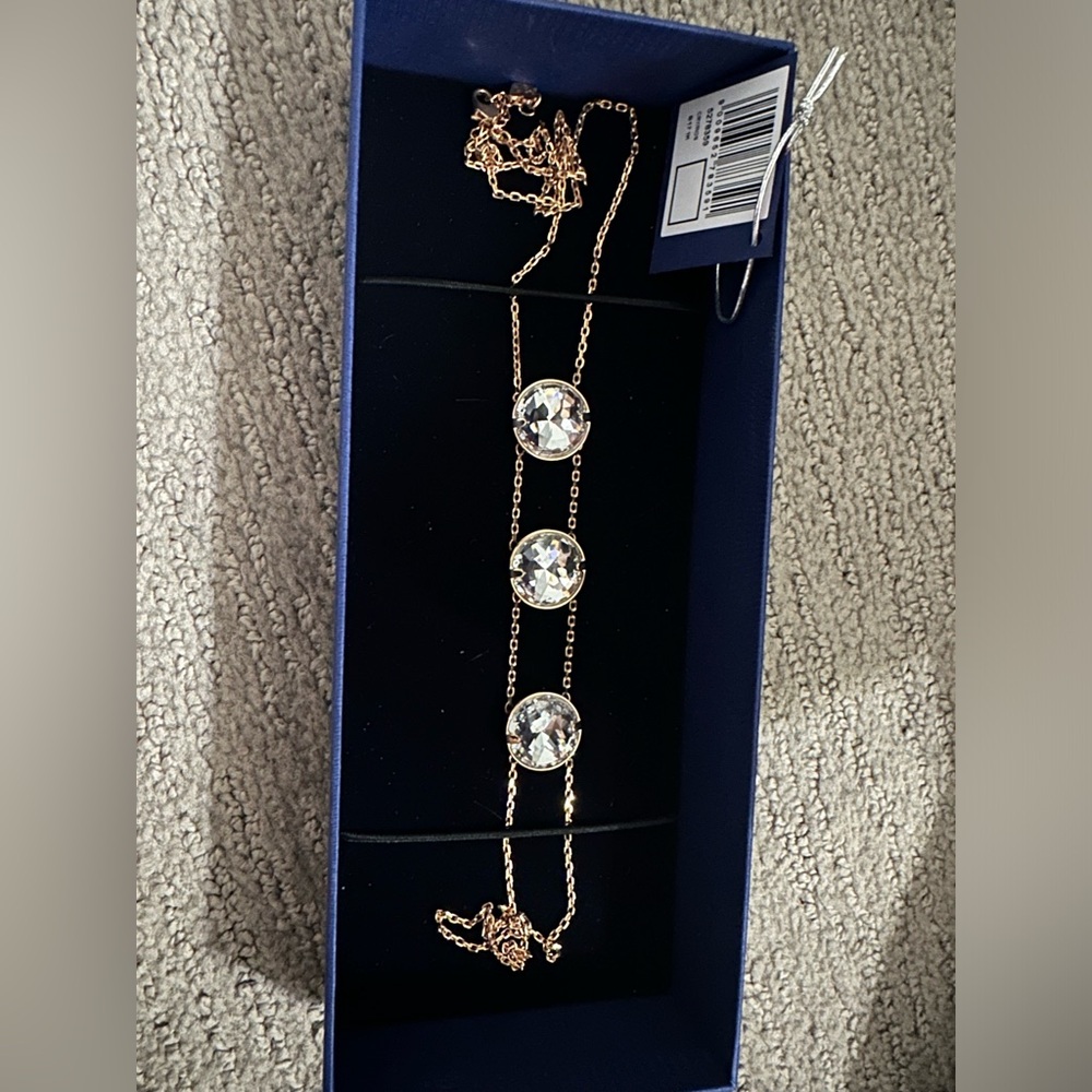 Swarovski crystal necklace, rose gold with 3 large crystals.